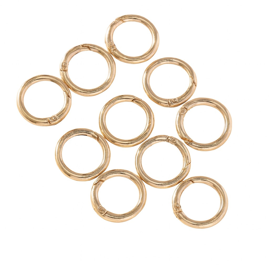 Mosquetones redondos color dorado