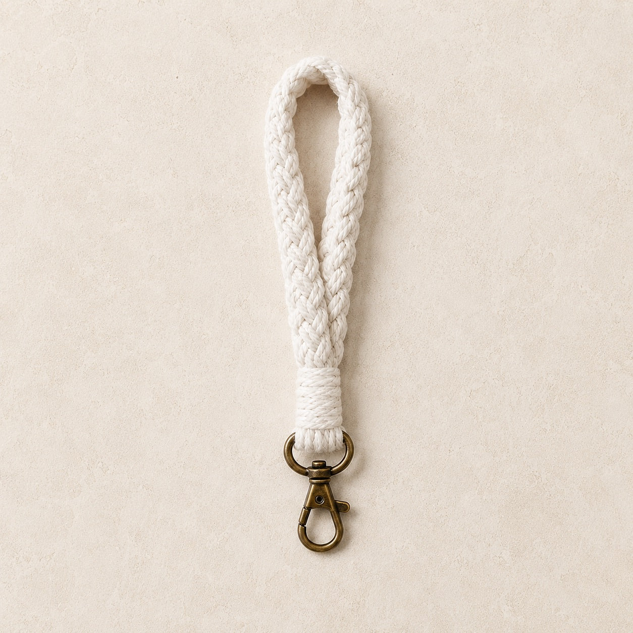 Asa de muñeca para clutch – Trenzada