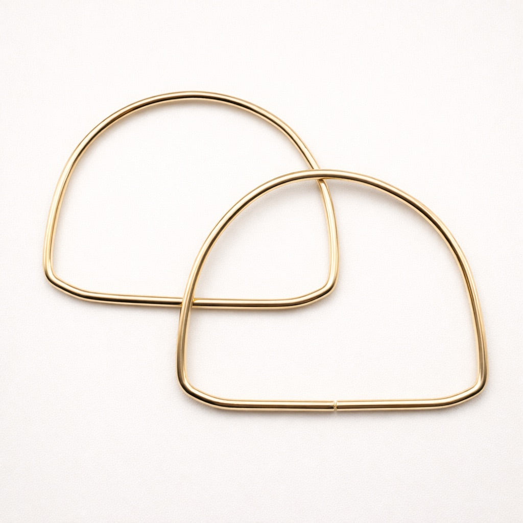 Asas semicircular metálicas doradas – 14 cm (par)